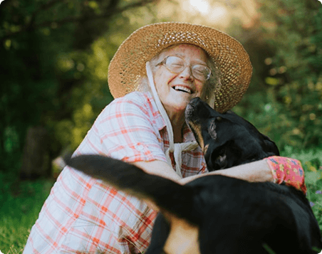 Elderly woman with her dog